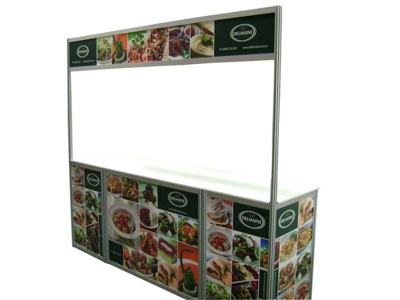 Brandframe sales table for Delmaine used at a food exhibition - Displays2Go.com.au