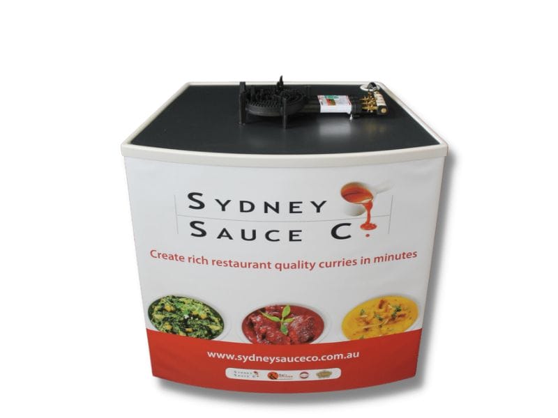 Sydney Sauce with drop-in heat guard added to table top - Displays 2 Go