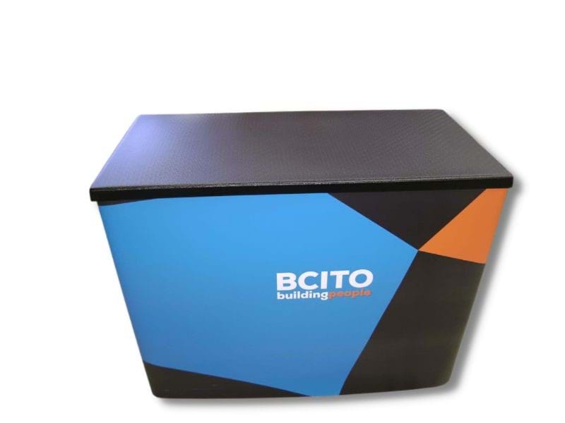 Superlight 1200 demonstration table with branded wrap and black top - Displays2Go