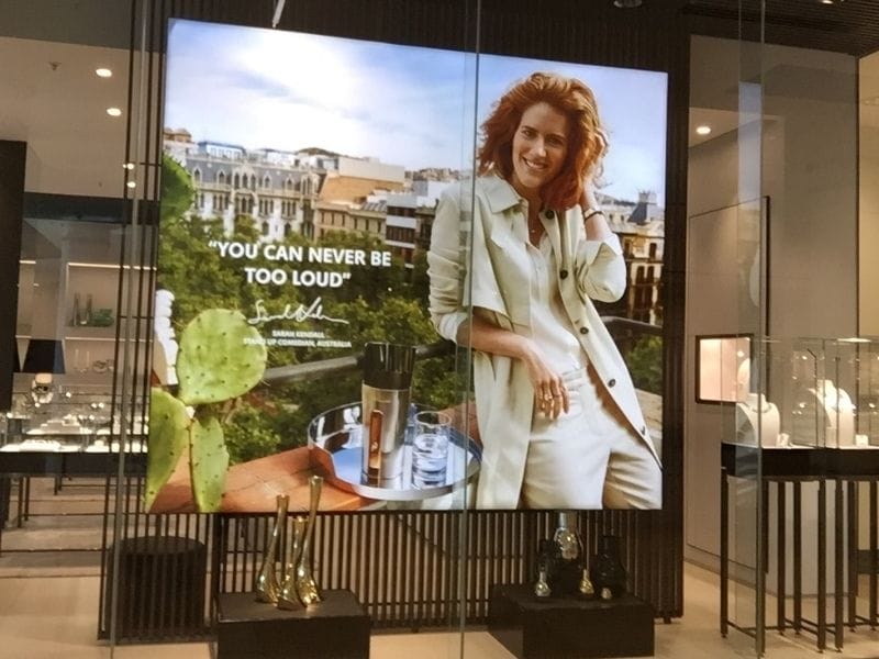 Illiminated brandframe in store window - Displays2Go