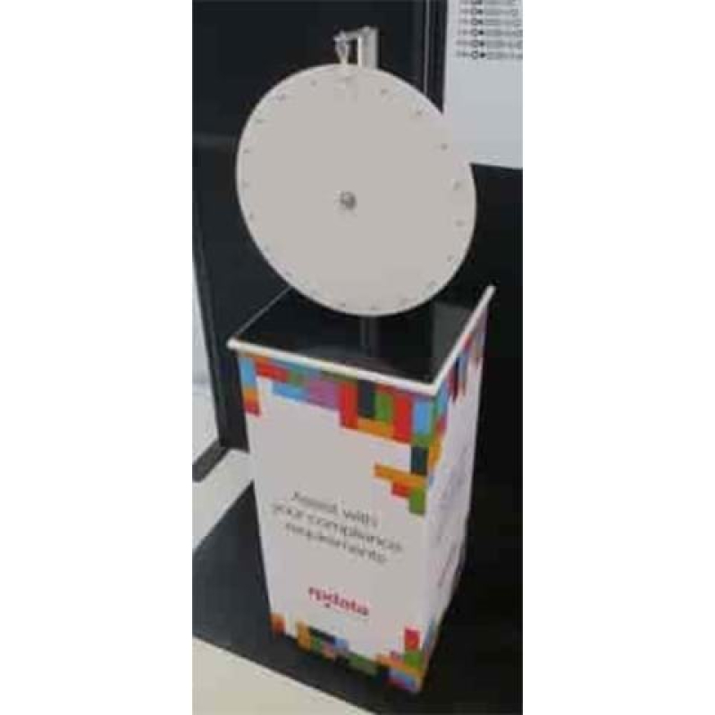 Game wheel sitting on top of an entry unit - Displays2Go