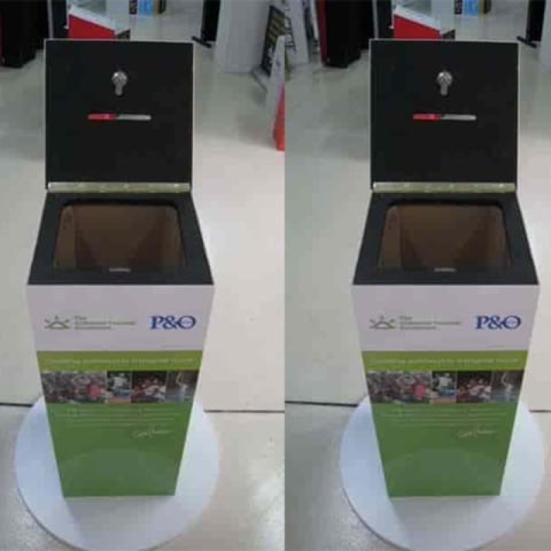 This money box has a hinged lid with a lock - Displays2Go