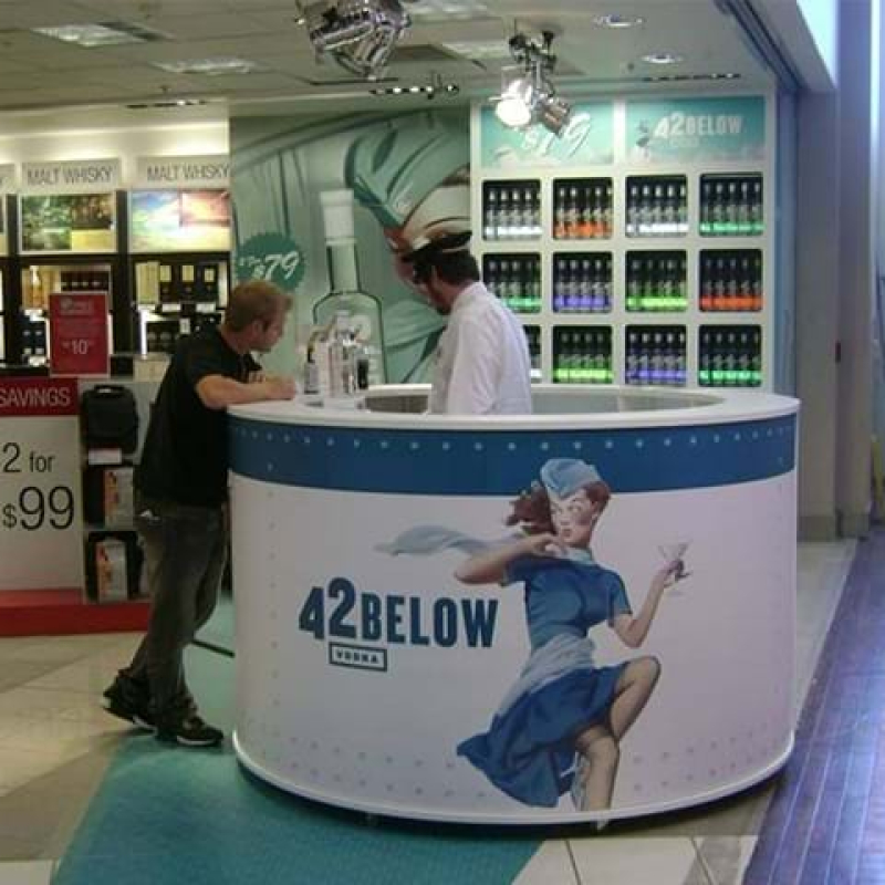 42 below kiosk train carried bottles around the circumference - Displays2Go