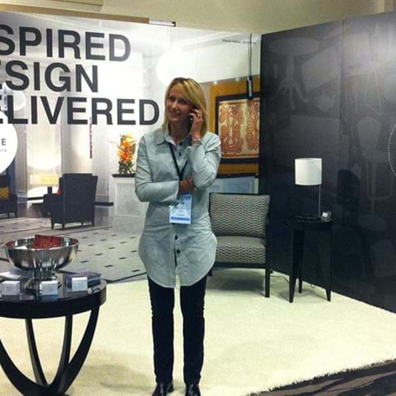 Folding laminated panels mounted to a booth wall - Displays2Go